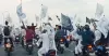 দেশে  হঠাৎ করে কালেমা খচিত সাদাকালো পতাকার মিছিল করছে কারা