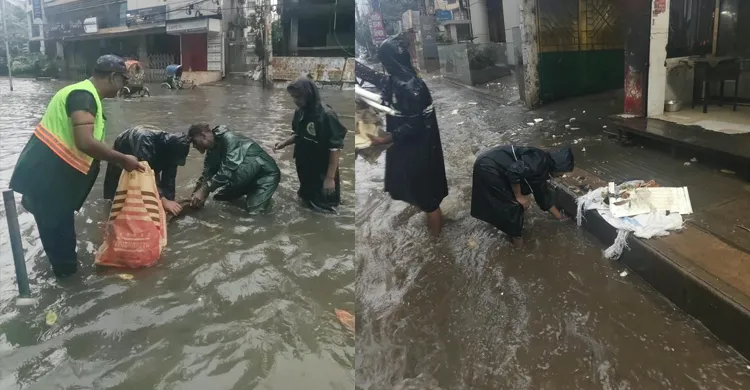 ভোরের ভারী বৃষ্টিতে ঢাকার বিভিন্ন সড়কে জলাবদ্ধতা, মাঠে ডিএসসিসির টিম